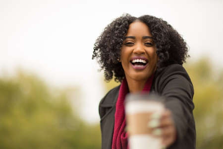Beautiful Confident African American Woman Smiling Outsideの写真素材