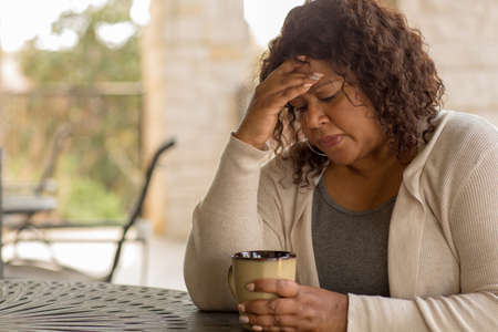 African American middle age woman looking sad.の写真素材