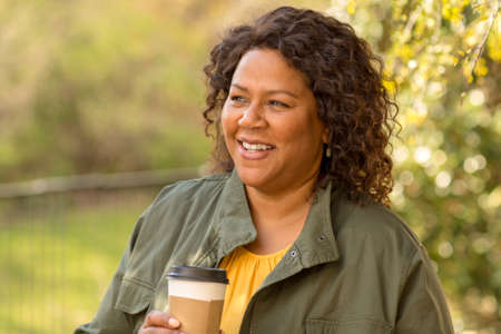 Beautiful mature African American woman smiling and laughing.