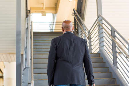 African American businessman heading out on a business trip.