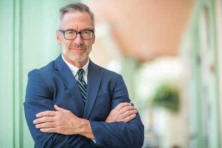 Portrait of a handsome mature confident businessmanの写真素材