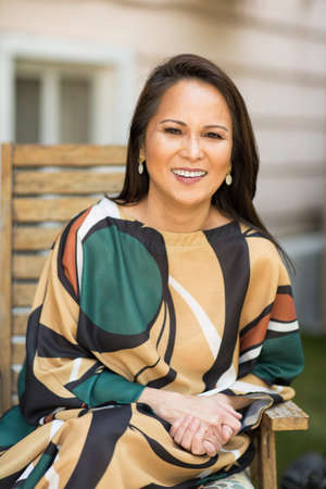 Happy mature Asian woman laughing and smiling.の写真素材