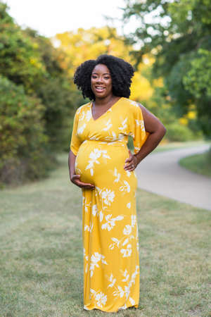 Portrait of a beautiful African American Pregnant Womanの写真素材