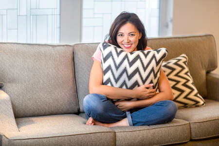 Portrait of a mature confident Asian smiling.の写真素材