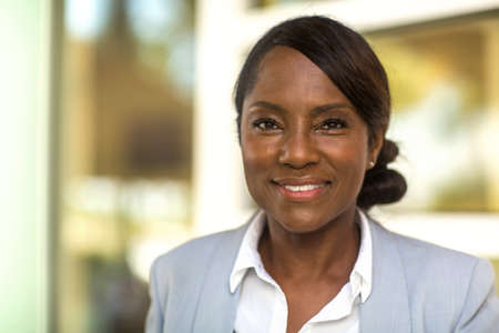 Portrait of a mature healthy older woman happy and smiling.