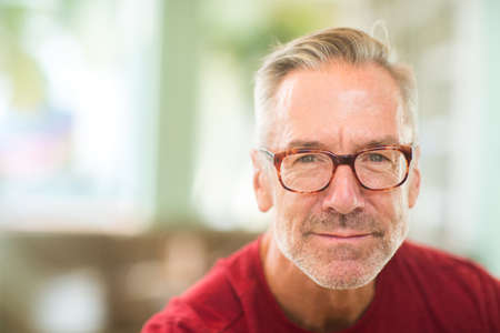 Mature handome fit man sitting outside stock photoの写真素材