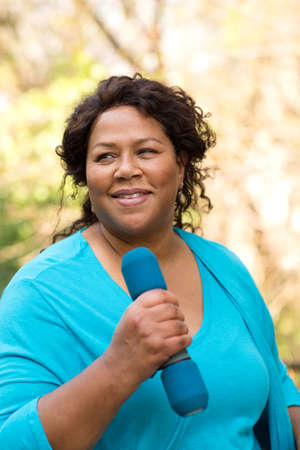 Beautiful mature African American woman smiling and laughing.