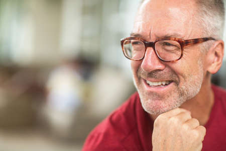 Mature handome fit man sitting outside stock photoの写真素材