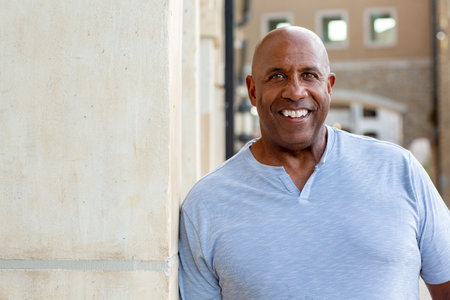 Portrait of an African American man standing outside.の写真素材