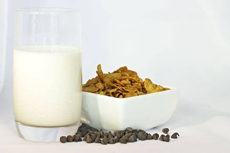 close up photo of a cup of corn flakes for a morning breakfast