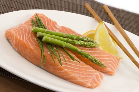 photo of fresh slices of salmon with asparagusの写真素材