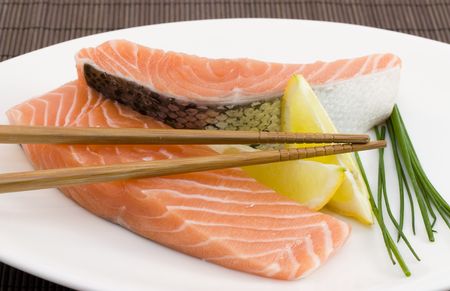 photo of fresh slice of salmon with lemonの写真素材