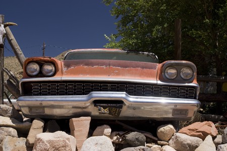 Old car in the famous route 66 road in USAの写真素材