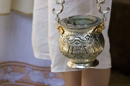 Holy water container at the church celebrationの写真素材