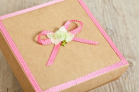 Cute decorated gift pack for present with pink ribbonの写真素材