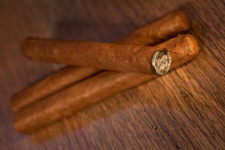 Typical havana cigars on wooden backgroundの写真素材