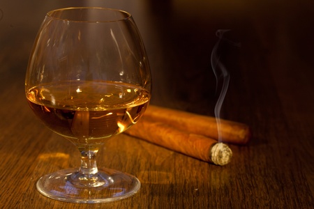 typical havana cigars with pure whisky drink backgroundの写真素材