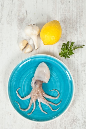 Fresh raw octopus ready to be cookedの写真素材
