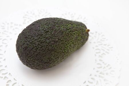 fresh tasty avocado fruit on white backgroundの写真素材