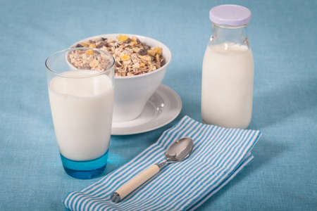 Healthy nutrition with fresh milk and muesliの写真素材