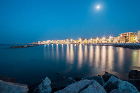 South of italy seaside view at sunset with many reflectionsの写真素材