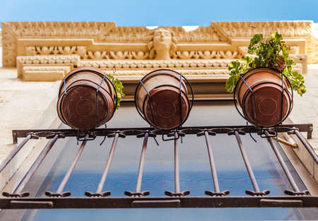 Three jars on a balcony in the south of italyの写真素材