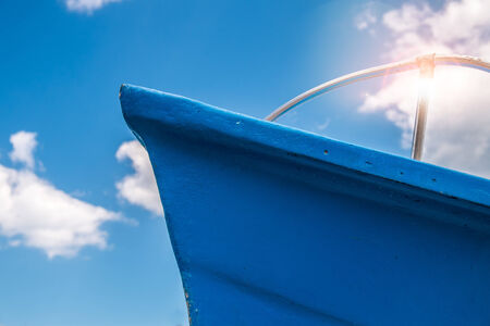Blue bow of a fishing boat in the south of italyの写真素材
