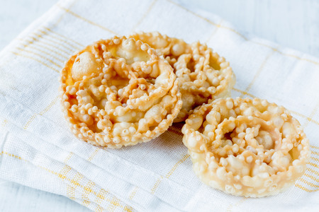 Cartellate, traditional home made pastries filled with figs syrupの写真素材