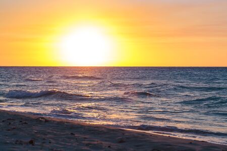Spectacular sunset on the famous Varadero sand beach in Cubaの写真素材