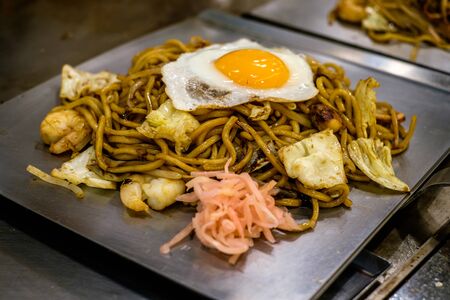 Typical tasty japanese okonomiyaki fast food in Kyoto