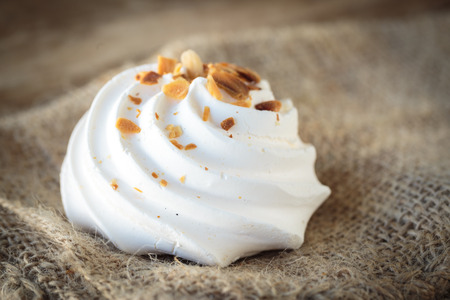 Delicious and beautiful Meringue cookie with toasted almondsの写真素材