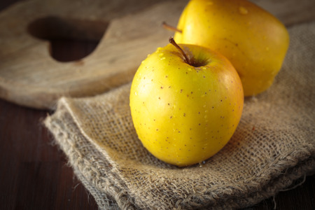 Fresh delicious yellow appleの写真素材