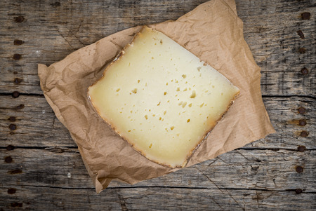 Delicious slice of fresh pecorino cheese from Italyの写真素材