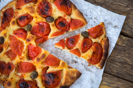Delicious italian home made focaccia bread with tomatoesの写真素材