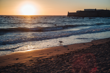 Sunset over the Atlantic Ocean in Cadiz, Andalusia, Spainの写真素材