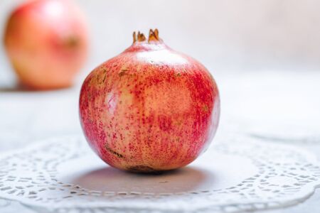 Delicious fresh pomegranate fruit for healthy nutritionの写真素材