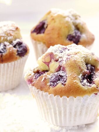muffins with red berriesの写真素材