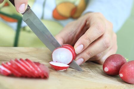 A sharp knife to slice the radishes well