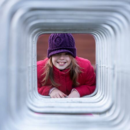 Cute little girl in the frameの写真素材