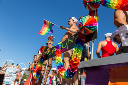 Sitges,Spain. June 19th, 2016: Half naked members of the gay community on the pride parade 2016 in...