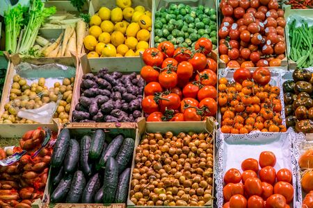 Famous La Boqueria market with vegetables and fruits in Barcelona, Spainの写真素材