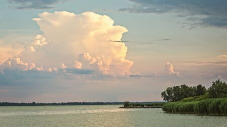 Big powerful storm clouds over the lake Balaton in Hungaryの写真素材