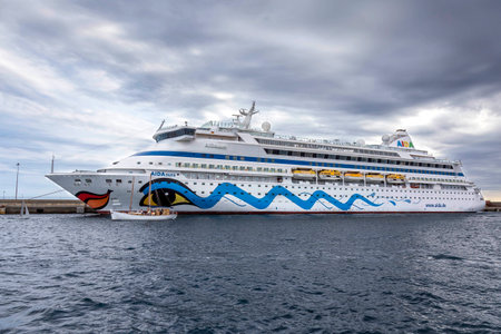 Big cruise ship in harbor Palamos in Spain, Aida Aura from Italia, length 203m, passengers 1497, August 09, 2017 Spainのeditorial素材