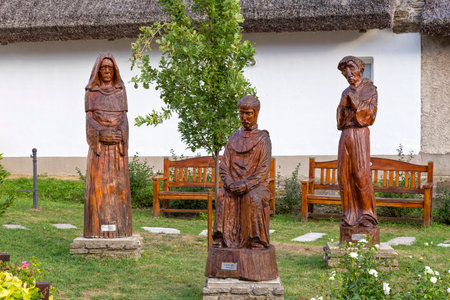 Beautiful carved sculptures in hungarian village Tihanyのeditorial素材