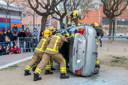 Firemanâs exhibition on village Palamos. Imitated car accident, with one injured person. March 10, 2018 , Spainのeditorial素材