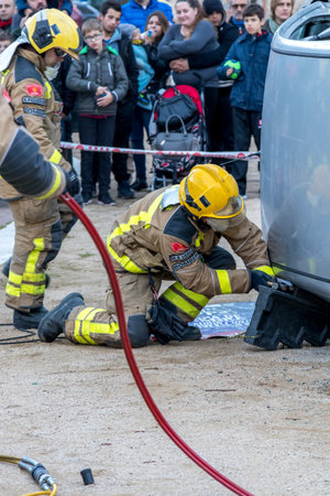 Firemanâs exhibition on village Palamos. Imitated car accident, with one injured person. March 10, 2018 , Spainのeditorial素材
