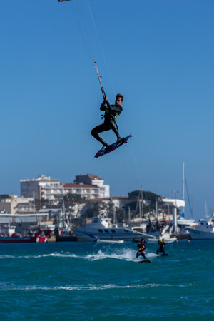 Kite surfer in Palamos Bay in a very windy day on March 10, 2018, Spain