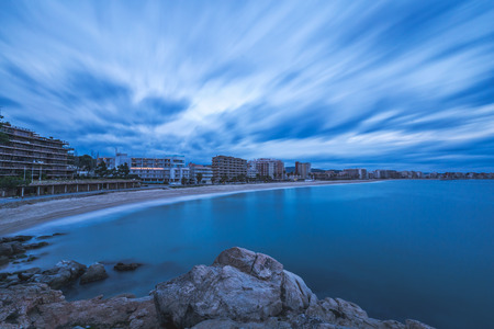 Long exposure evening picture in a beach in a Spanish village Sant antoni de Calonge in Costa Brava.の写真素材