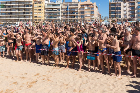 First bath of the year on the ocean in village Palamos in Costa Brava. 04.01. 2018 village Palamos Spainのeditorial素材