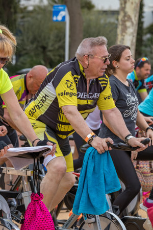 Sports and health day outdoors in Costa Brava in town Palamos. Spinning class. 07. 04. 2018 town Palamos in Spainのeditorial素材